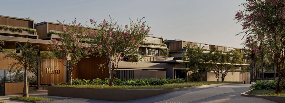 Vista interna de área comum de edifício residencial moderno com iluminação natural, vegetação e espaço de convivência.
